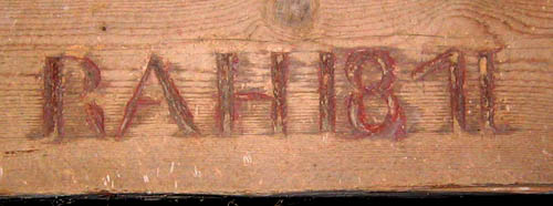 Initials carved in truss at end of barn, Kilner Foot